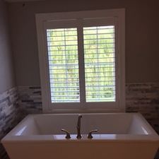 composite-plantation-shutters-bathroom-fenton 0