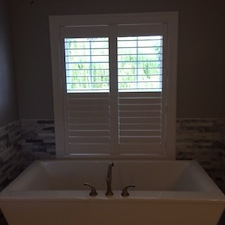 composite-plantation-shutters-bathroom-fenton 1